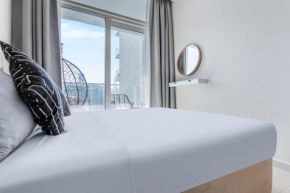 Reva Residences - One Bedroom Apartment by the S Holiday Homes